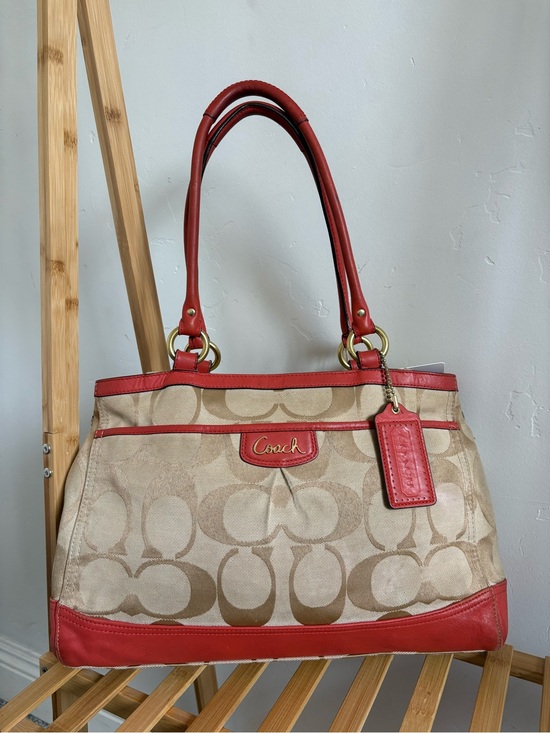 Coach Handbags - Coach Beige Signature Canvas Tote with orange trim